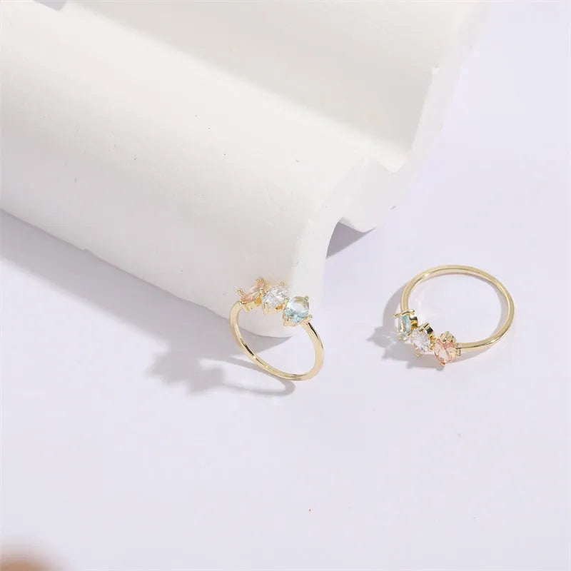 Geometric triangle birthstone ring with horse eye tricolor zircon stone in 14k gold plating