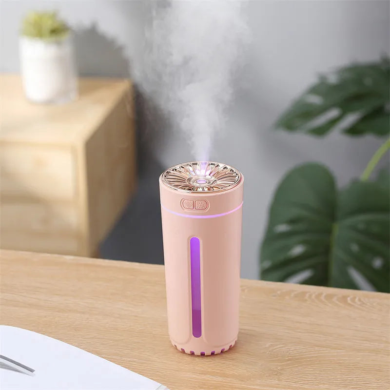 Black portable USB rechargeable humidifier with colourful LED lights on car cup holder