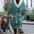 Men's peacock blue 3D printed casual suit with T-shirt and knitted shorts on a hanger