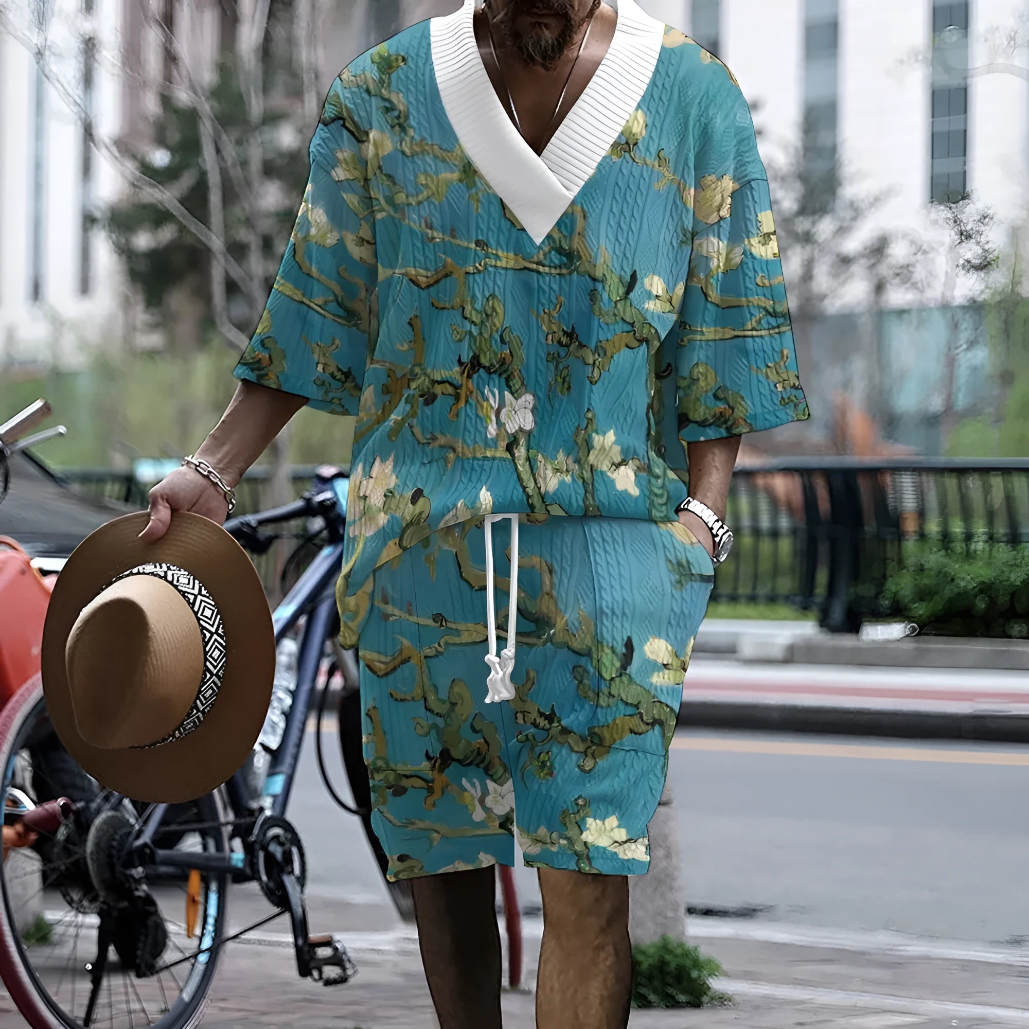 Men's peacock blue 3D printed casual suit with T-shirt and knitted shorts on a hanger