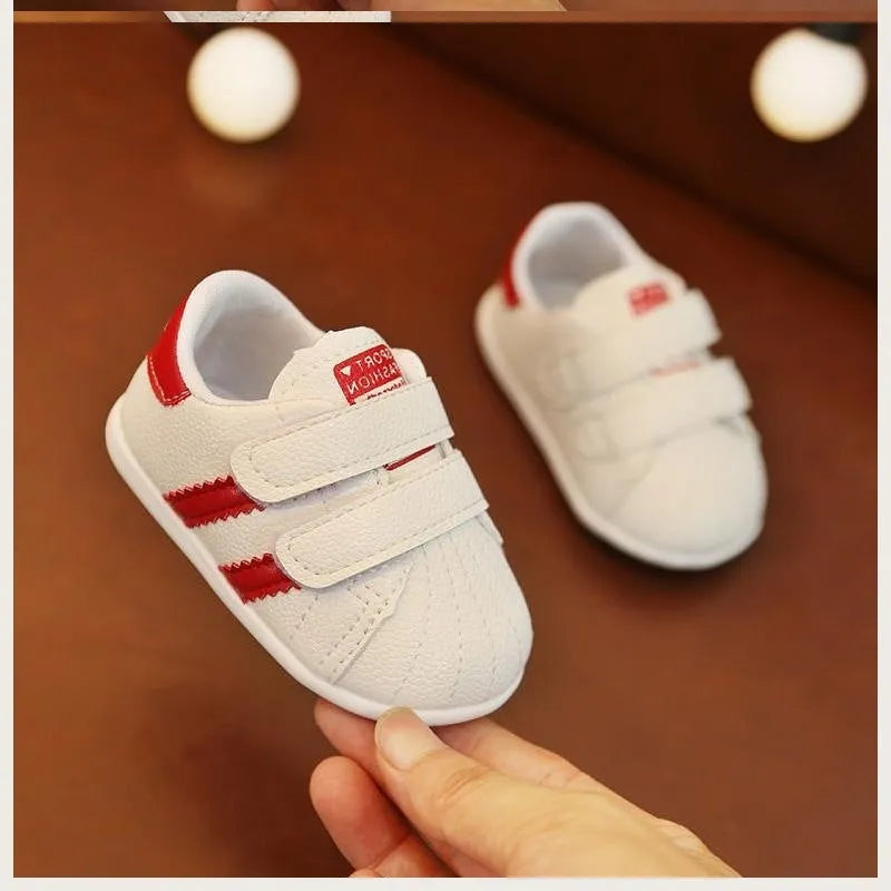Toddler shoes 0-18 months with rubber antiskid sole, waterproof breathable upper, black or red, sizes 11cm to 13cm