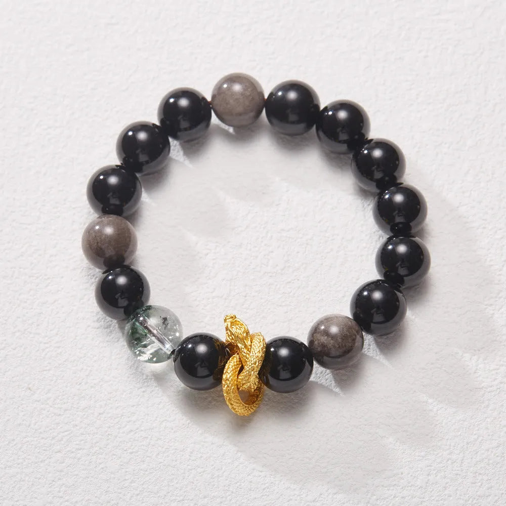 Purple cornucopia crystal bracelet with 10mm animal zodiac beads on wrist