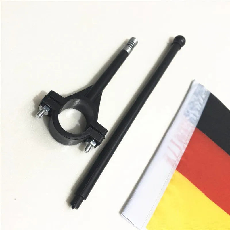 Square polyester car flag attached to a white plastic handlebar flagpole.
