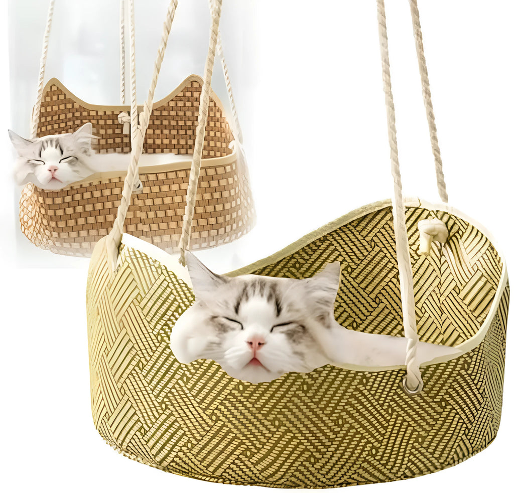 Green rattan cat hammock with cotton ropes and metal hooks, shown hanging.