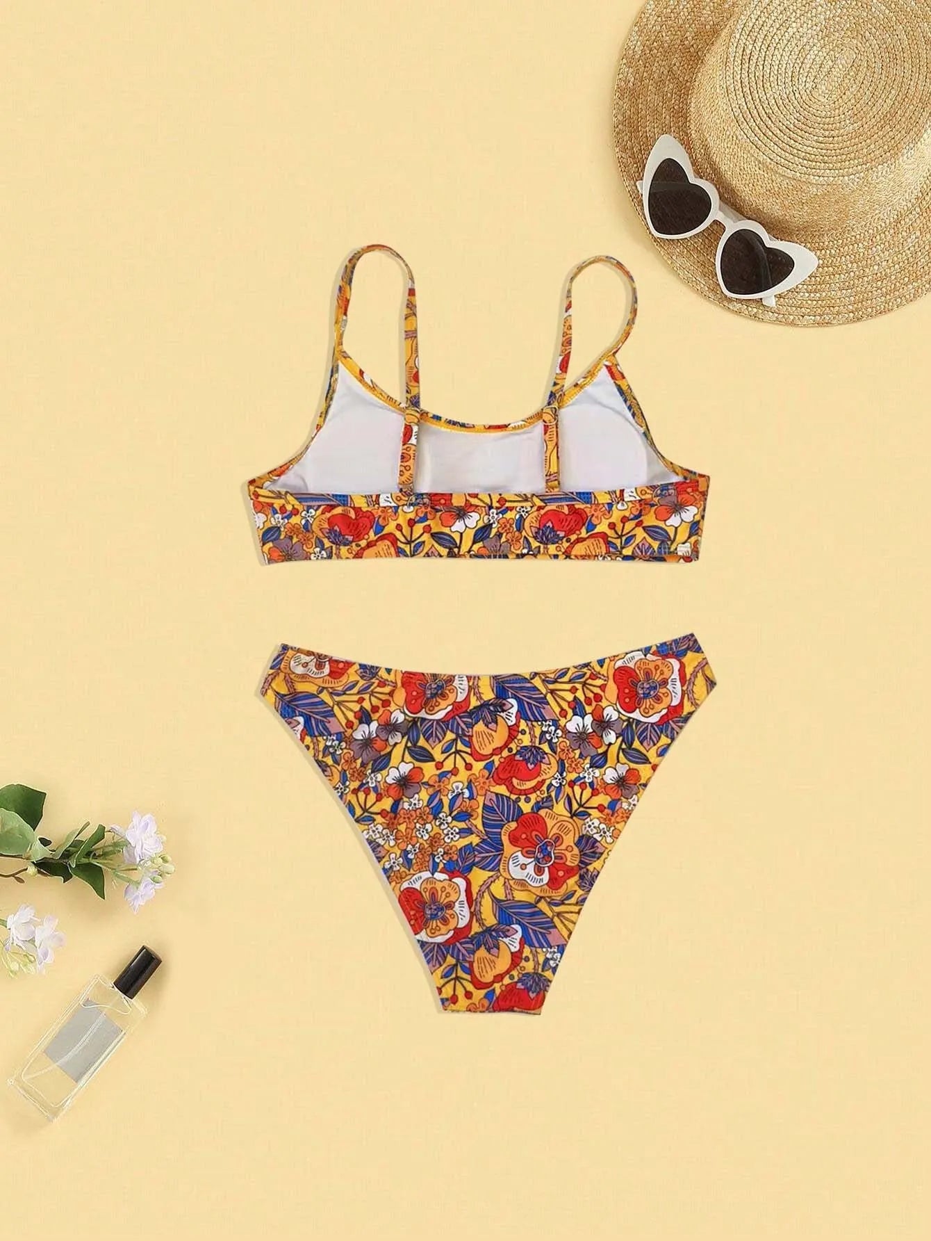 Plus size floral print women's bikini swimsuit with adjustable straps.