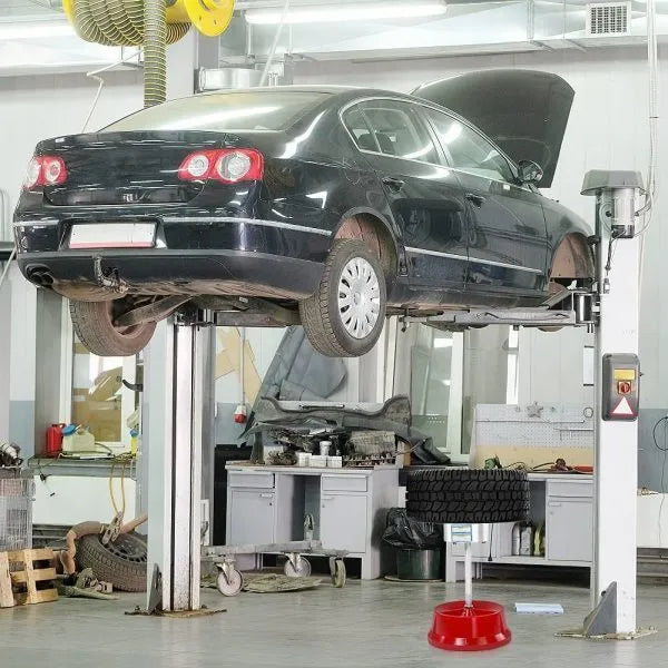 Portable aluminium hub balancer for car wheels with bull's eye level on a non-rust enamel base.
