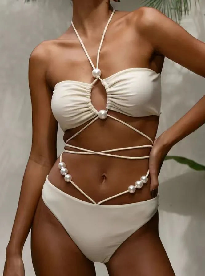 Black women's two-piece bikini swimsuit with lace-up front detail on the top.