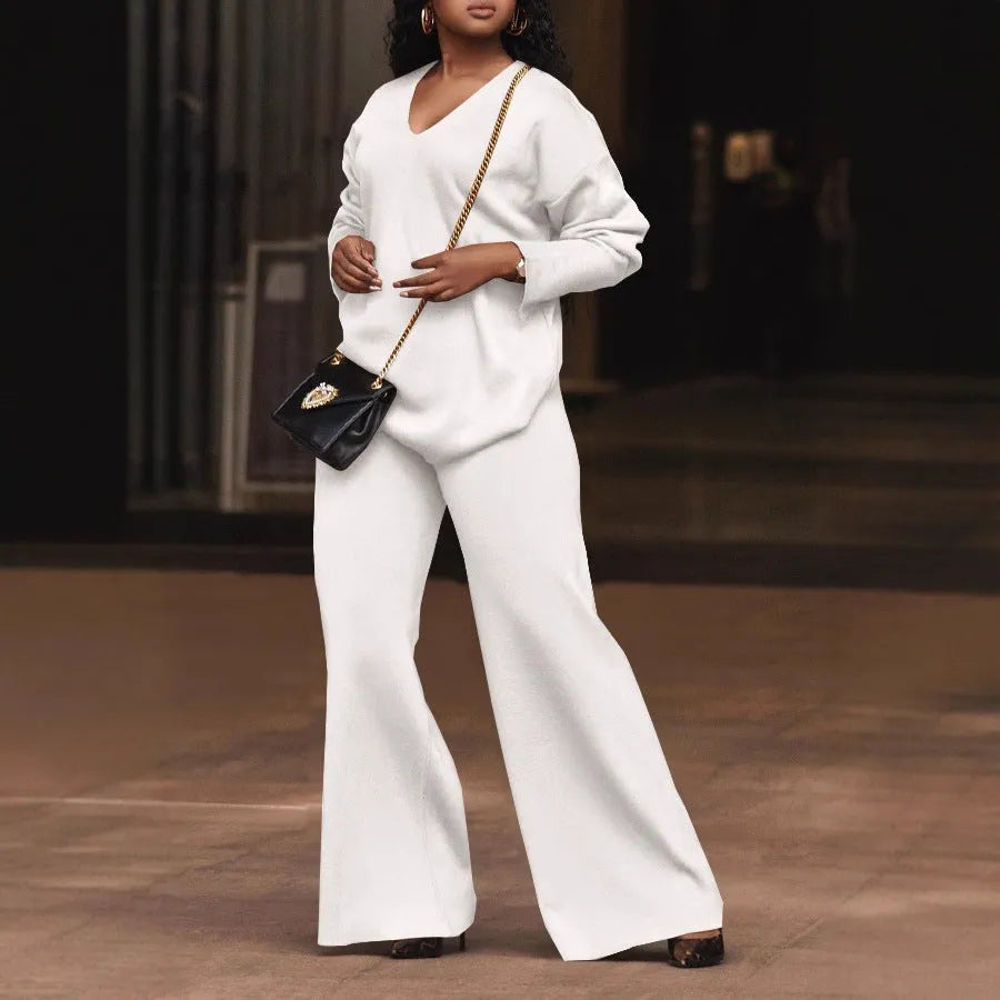 Women's brown thick suede velvet two-piece suit with split long sleeves and matching trousers.