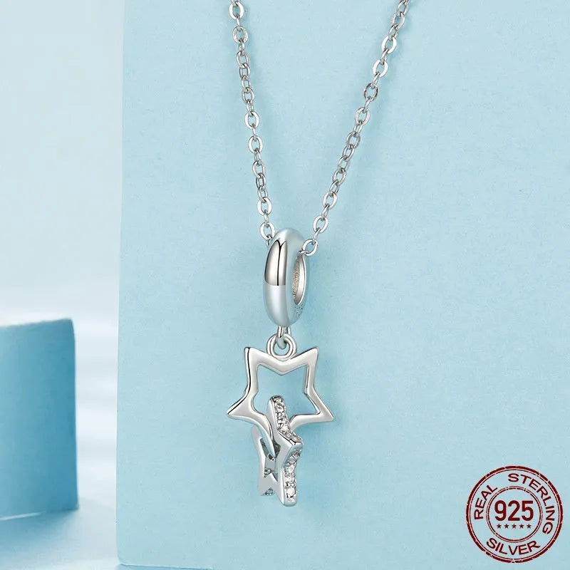 Single S925 sterling silver starlight bead 2.4cm tall with 0.45cm aperture on white background