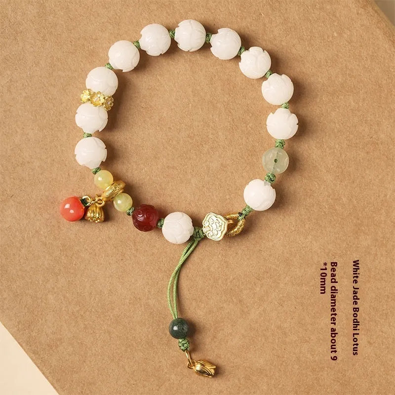 White jade bodhi bracelet with lotus and pumpkin beads on open rope