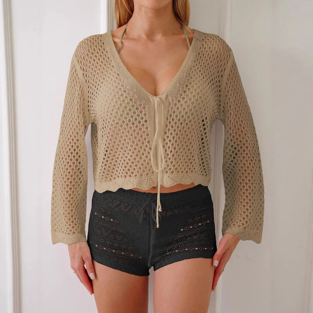 Cotton-like women's hollow woven cardigan blouse with bell sleeves in apricot colour.