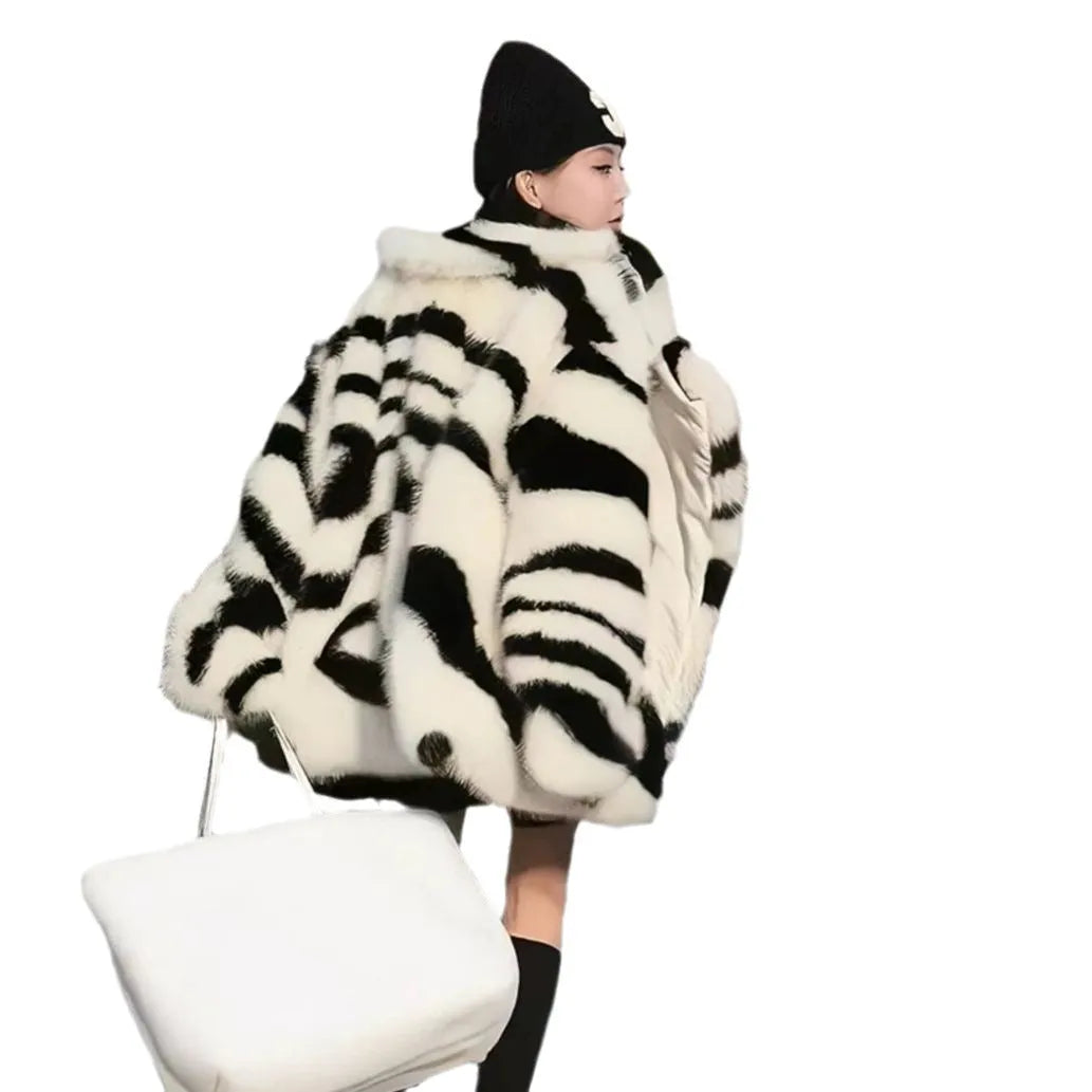 Women's long sleeve zebra stripe top with skimmer collar in black and white animal print pattern