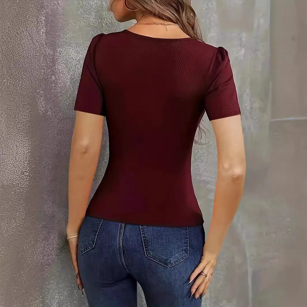 Women's wine red slim fit knitted short sleeve pullover top with a low neckline.