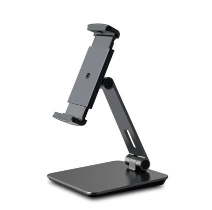 Silver foldable aluminium phone tablet holder on desk showing 360° rotation