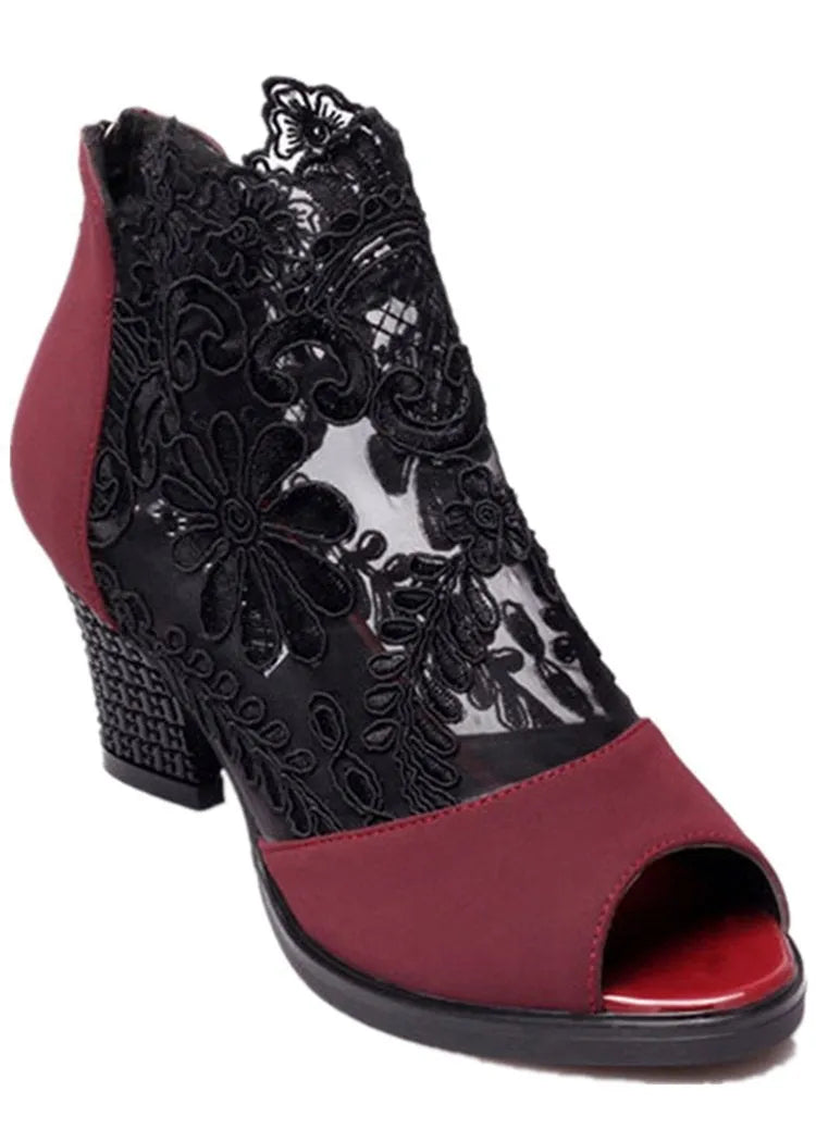 Black lace women's gladiator sandals with a square high heel and peep toe.