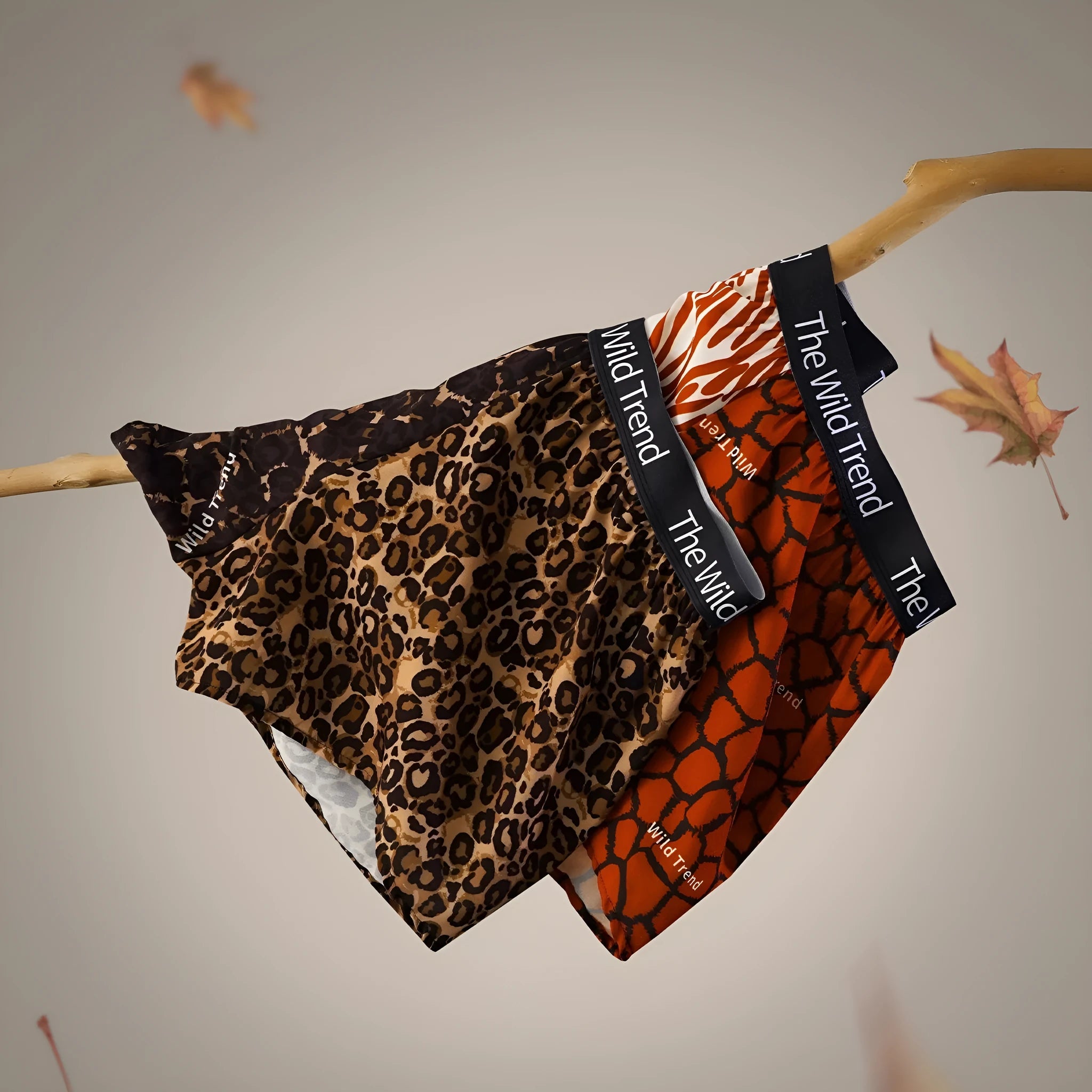 Men's leopard print casual shorts in loose fit with mid waist, made from quick-drying ice silk polyester.