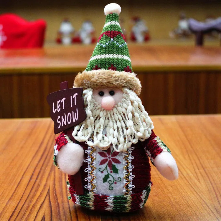 Red, green and white flannel snowman Christmas decorations measuring 18cm by 13cm