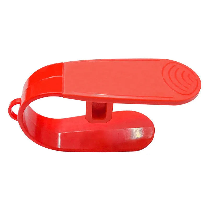 Red ABS coated car seat buckle unlocker measuring 4 x 9 cm on a keyring