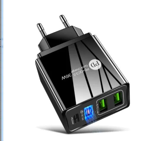 Black and white dual USB travel wall charger with EU, UK, and US plug heads