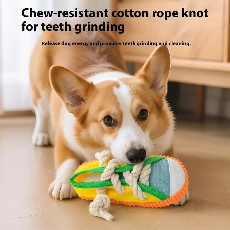 Slipper-shaped plastic dog chew toy with a squeaker, shown in yellow, black, and blue colour options.