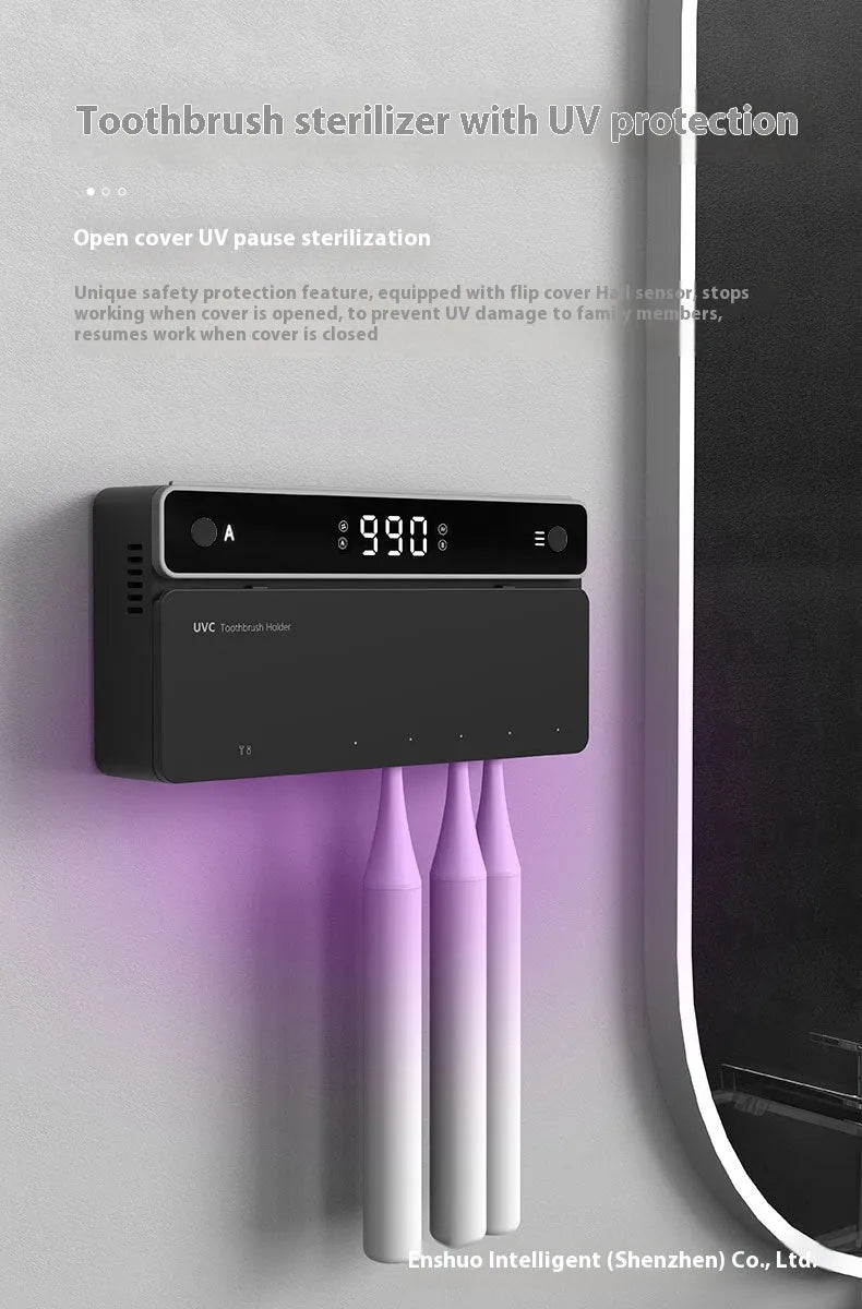 Black toothbrush sterilizer mounted on bathroom wall with UV disinfection and automatic drying
