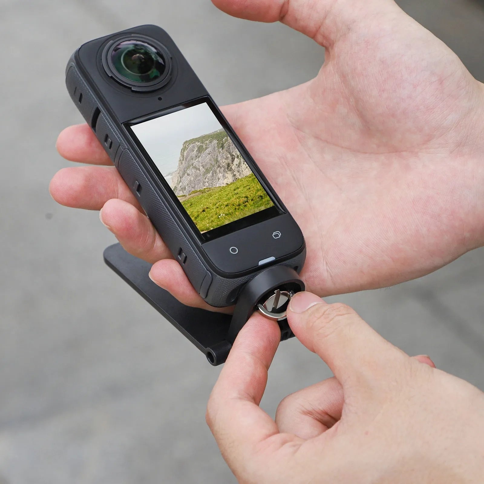 Black magnetic bracket base handheld handle accessory for Insta360 X4 camera with angle adjustment mechanism