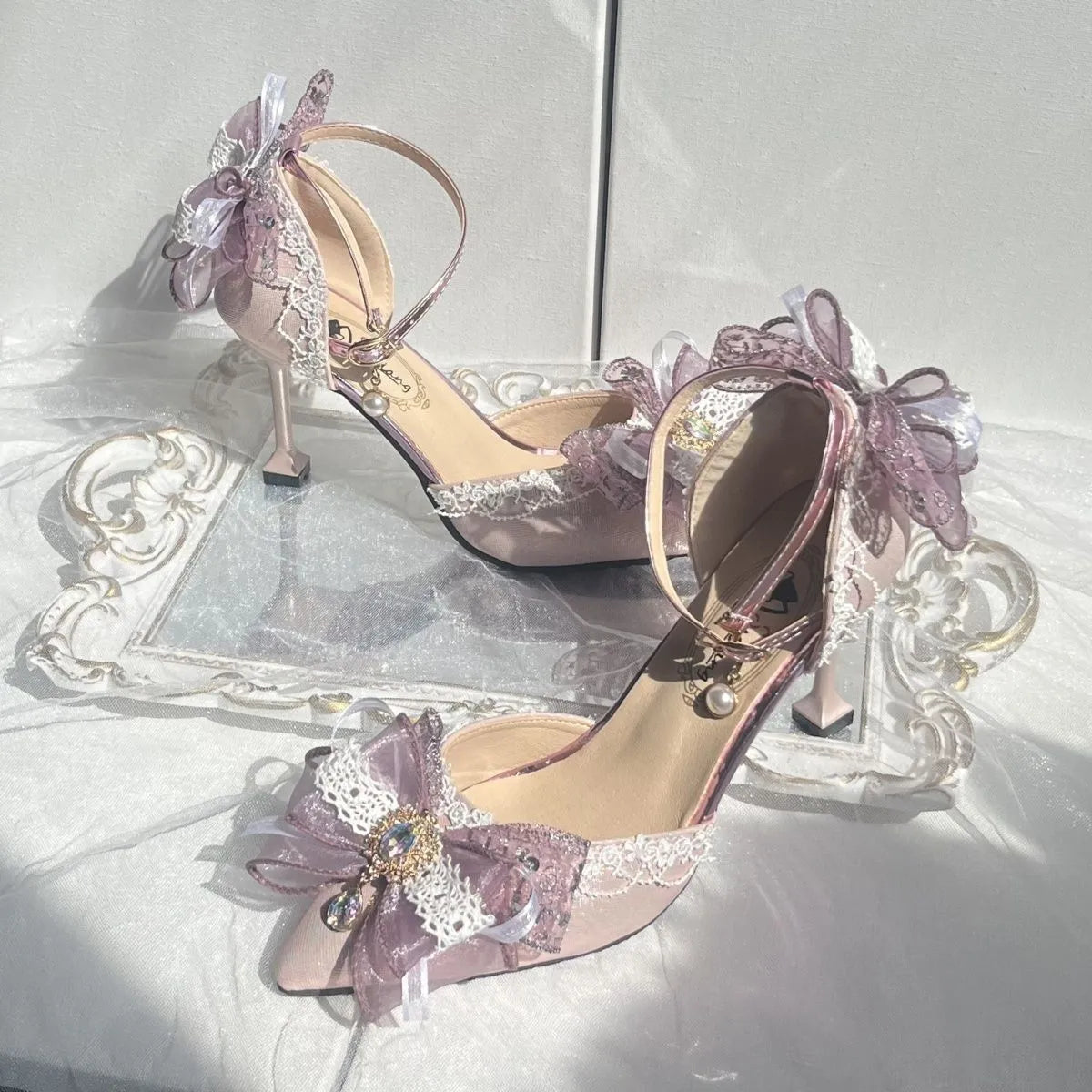 Purple women's flat wedding shoes with satin upper, flower decoration, and a square toe.