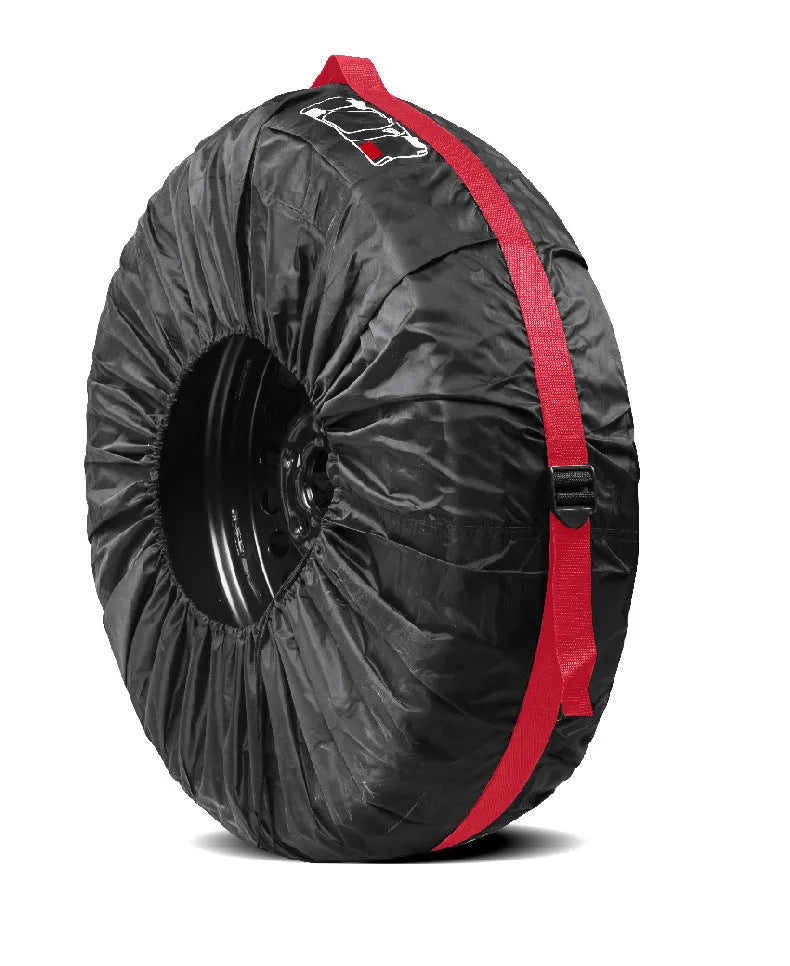 Set of four black Oxford cloth car tyre protective covers laid flat