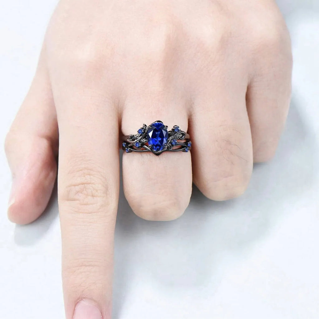 Gun black women's couple ring with navy blue rhinestone inlay on geometric copper band