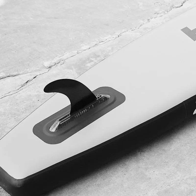 SUP paddle with removable fish fins attached, model YQ310, plastic construction.