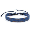 Handmade denim bracelet carrying strap shown in one of eleven available colour options with mixed material construction