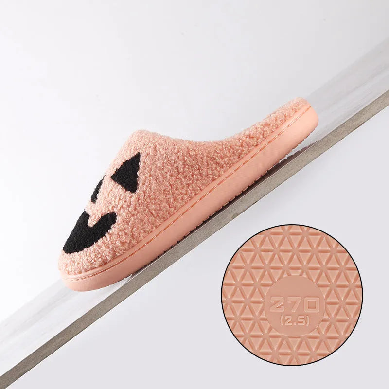 Halloween pumpkin cartoon thermal winter cotton slippers with suede upper, non-slip TPR sole, available in black and watermelon red