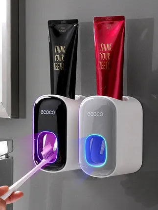 Wall mounted automatic toothpaste dispenser and toothbrush holder set with suction cup mounting