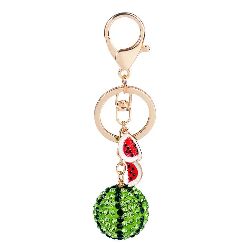 Green watermelon-shaped metal keychain made from zinc alloy, 12cm long.