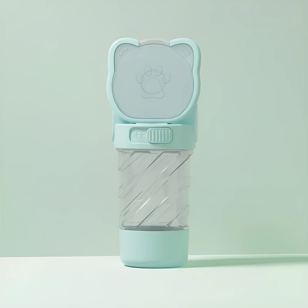 Green 3-in-1 portable pet water bottle with bowl, food container, and bag dispenser attached to a strap.