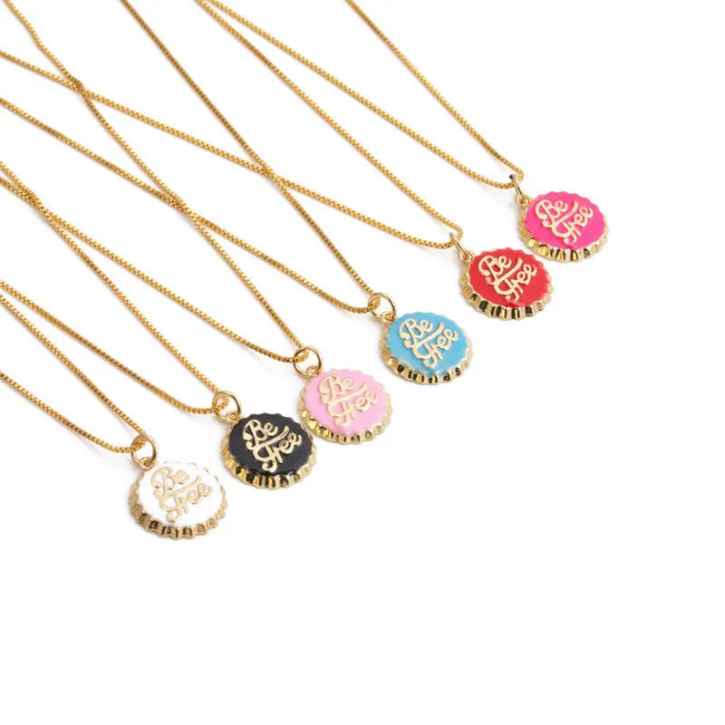Gold-plated copper bottle cap pendant necklace on a 40cm box chain.