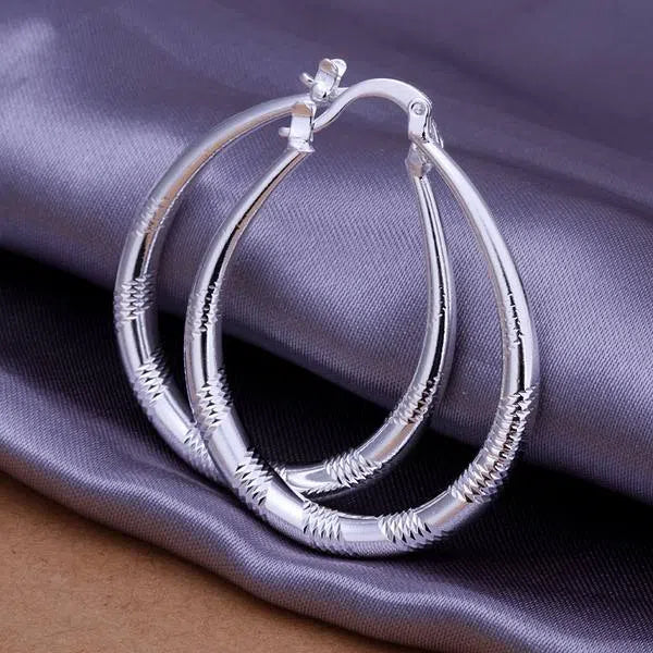 Creative silver tone hoop earrings with copper core and 925 silver plating, 3.9cm by 3.2cm