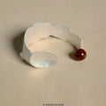 Small round spoon stewed pork alloy jewellery set with electroplated finish showing ring and bracelet pieces