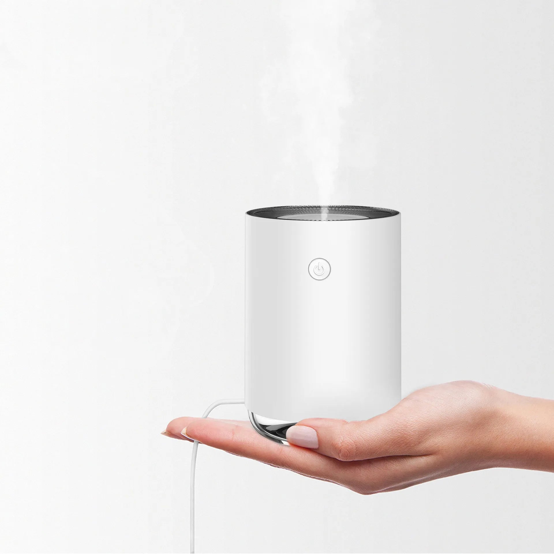 Green ultrasonic humidifier and essential oil diffuser with colour-changing LED night light.