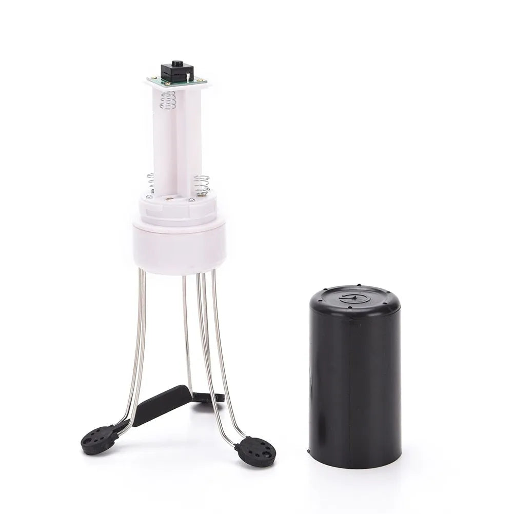White and black automatic stirrer blender on a kitchen counter