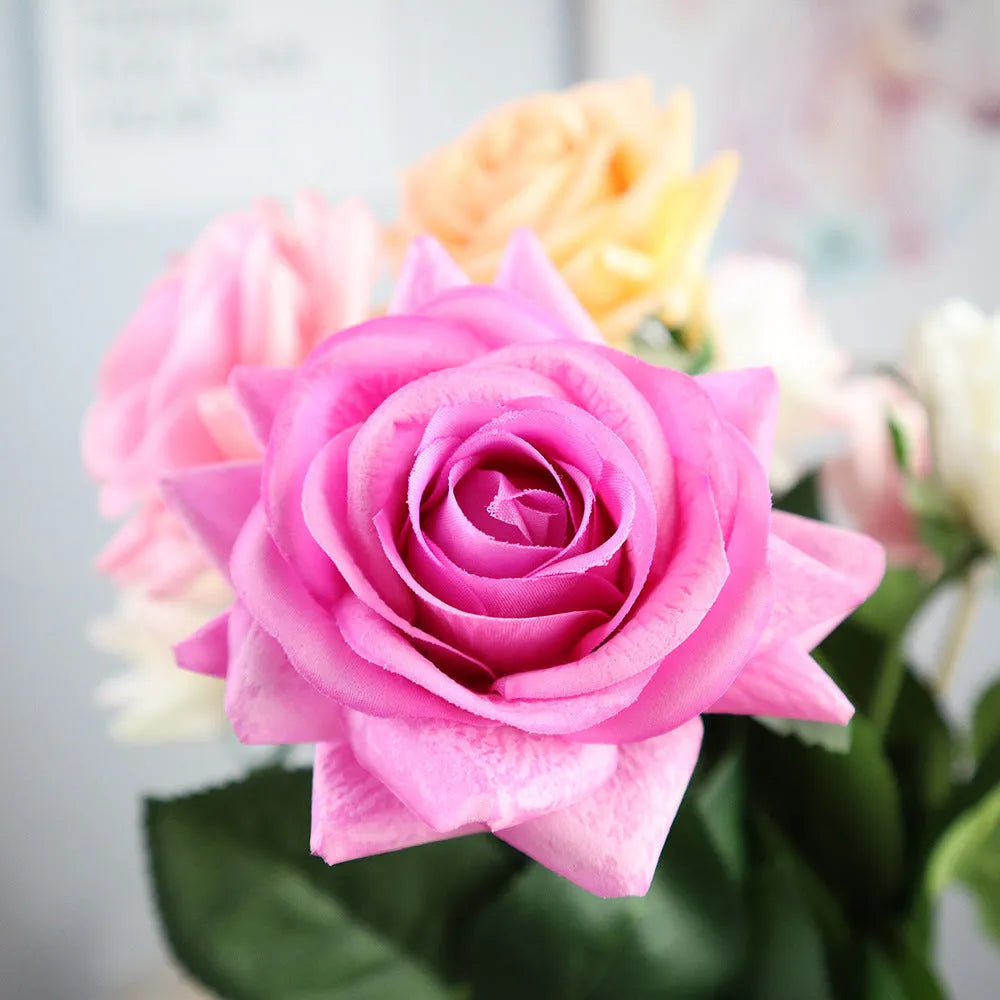 Artificial silk rose bouquet with 42cm length and 8.5cm flower head in multiple colour options
