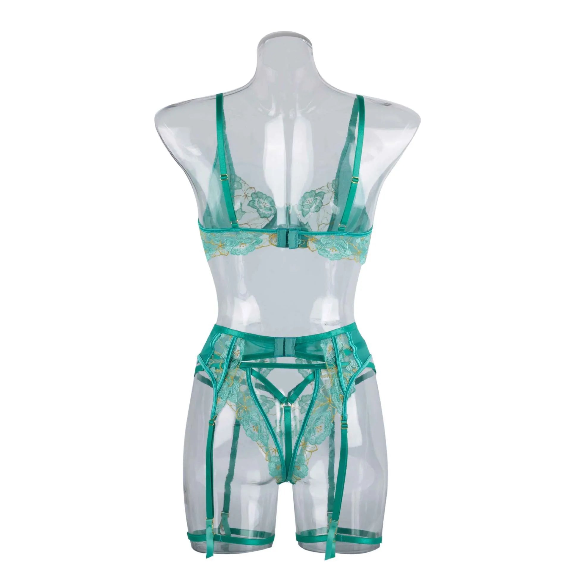 Light green women's embroidered bra and bikini set on a white background