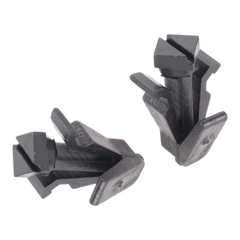 Black plastic fastening clip for Nissan bumper cover to radiator grille mounting