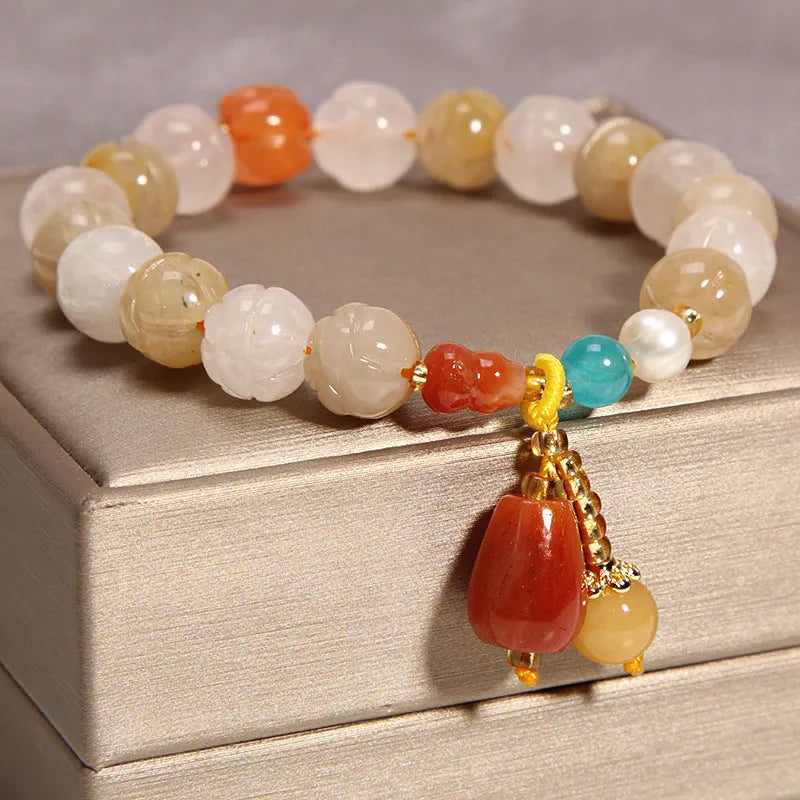 Women's yellow agate crystal bracelet on gold silk cord in khaki colour