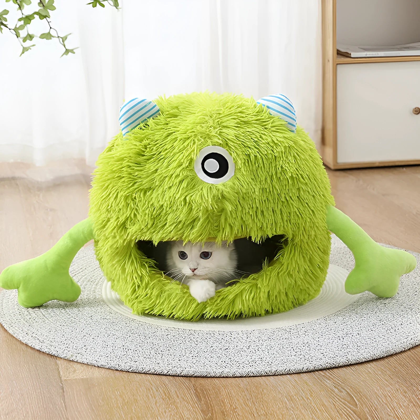 Fluffy round cat bed with non-slip base shown in three measured sizes
