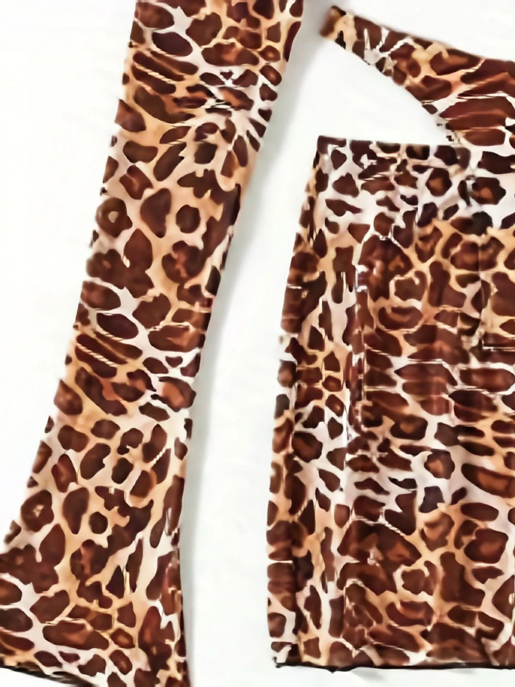 Women's leopard print split bikini swimsuit set with strapless top, high-waisted briefs, and matching skirt