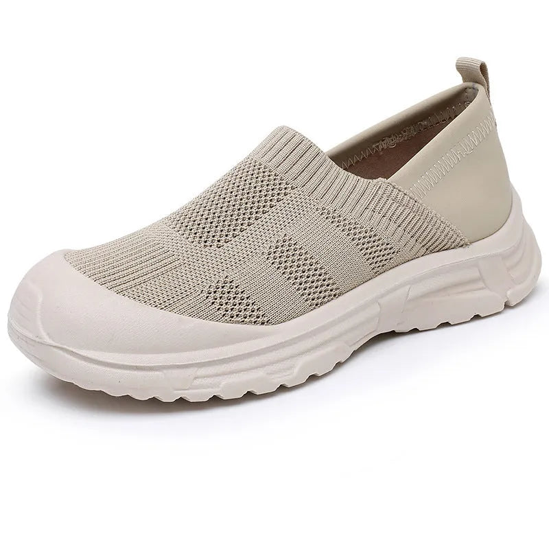 Women's black slip-on shoes with round toe design and soft PVC sole for casual wear