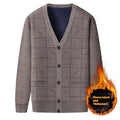 Plus-size men's grey fleece-lined cardigan with batwing sleeves on a hanger.