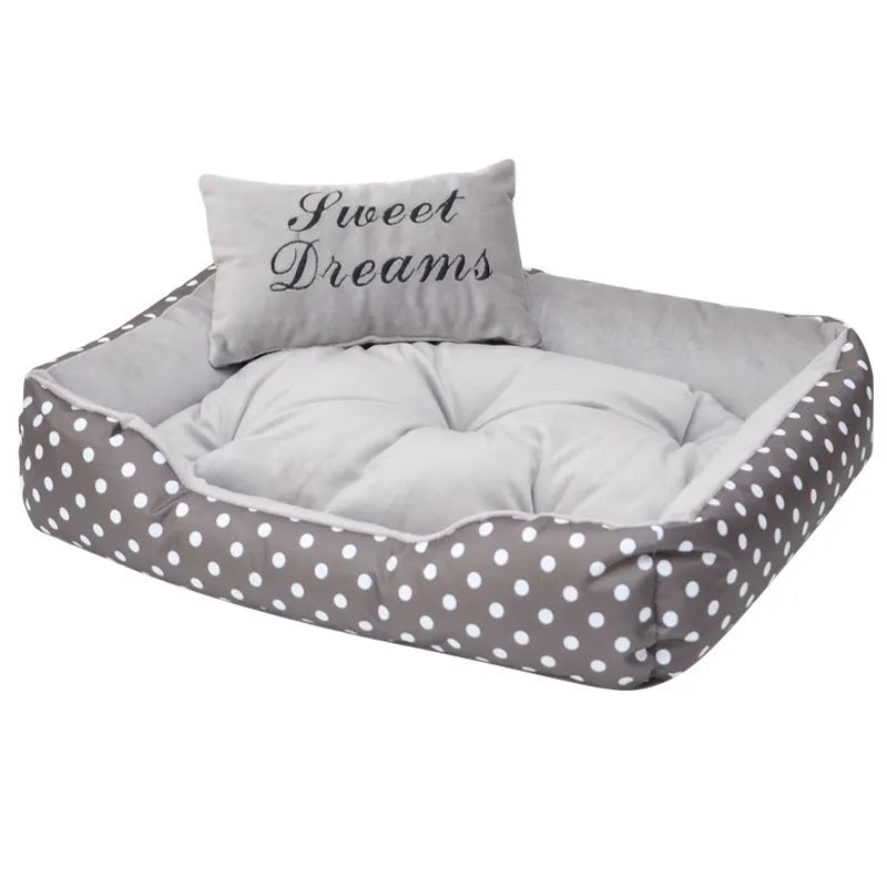 Polka dot print cloth dog bed with matching square pillow for small dogs, shown in grey colour.