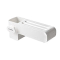 White plastic kitchen knife storage rack with compact dimensions on kitchen worktop